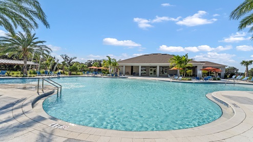 Cool off in the community pool with view.