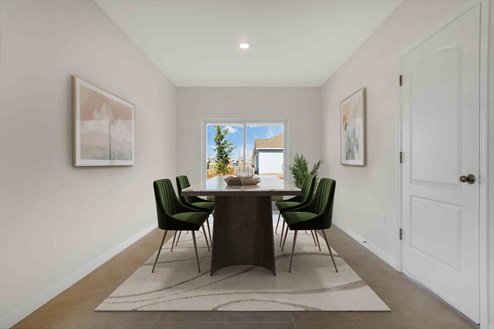 Dining room adjacent to the kitchen with table, chairs and tile flooring.