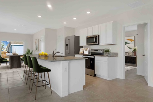 Kitchen with view overlooking living area