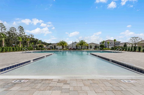 Cool off in the community pool with view.
