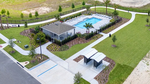 Cool off in the community pool with view.