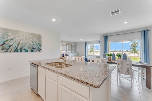 Kitchen with view overlooking living area