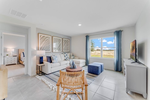 Open concept living area with couch seating