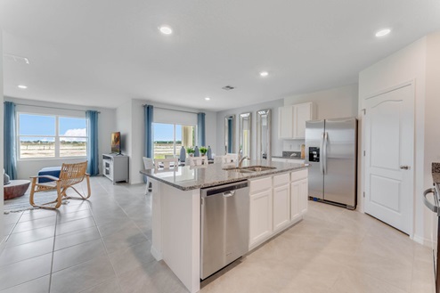 Kitchen with view overlooking living area.