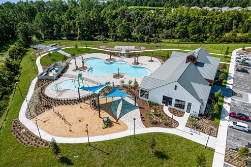 Arial view of clubhouse along with amenities.