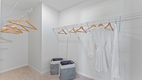 Spacious walk-in closet from master bedroom.