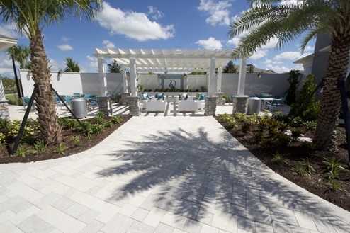 Entrace to outdoor area with couch seating and tables and seatings.