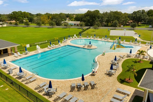 Cool off in the community pool with view.