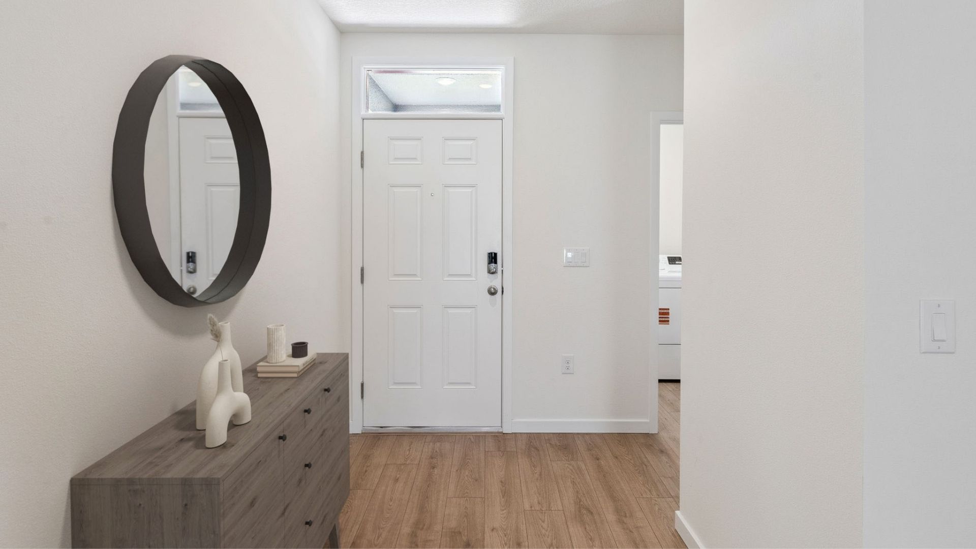 Entry way with laminate flooring.