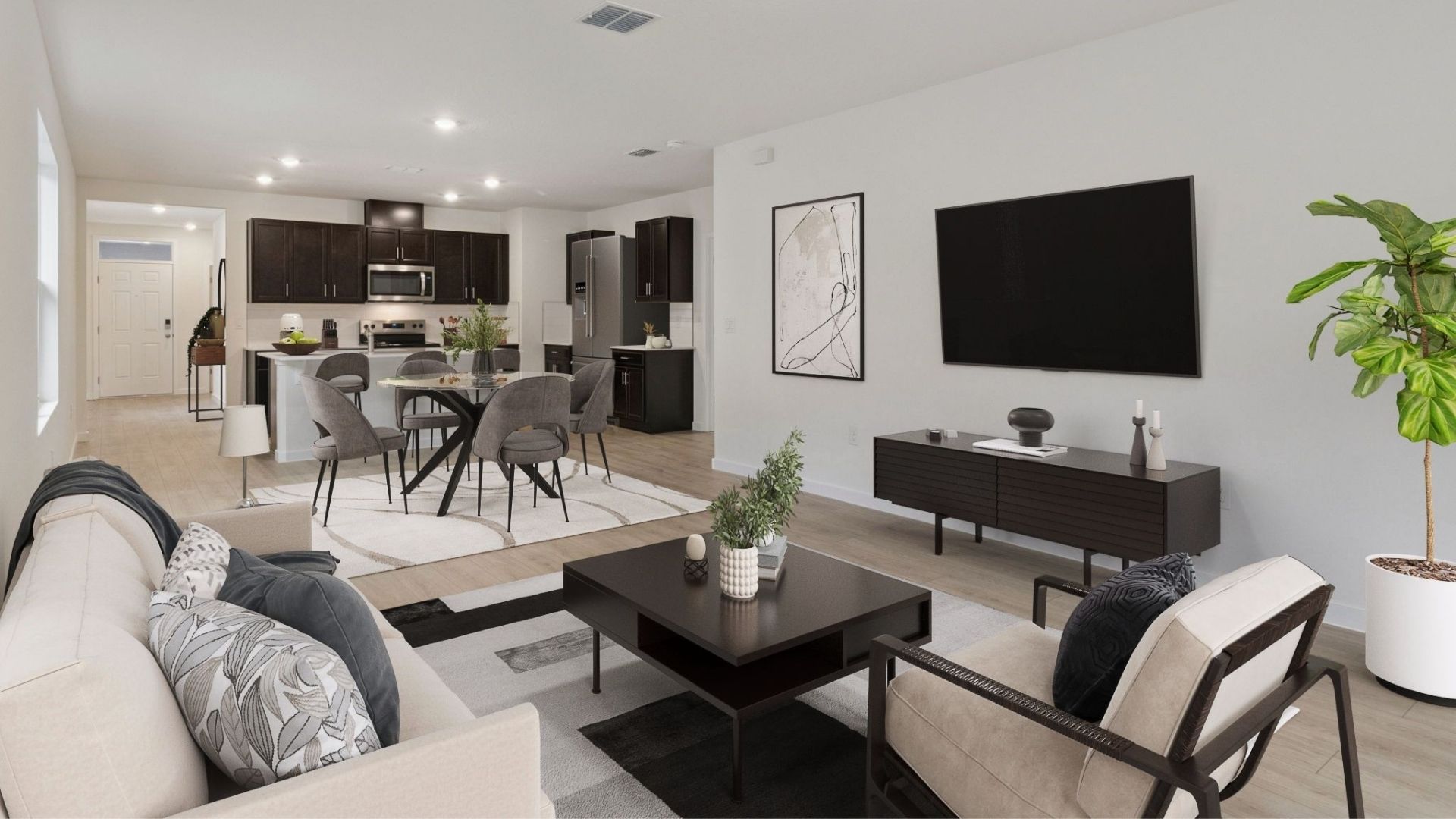 living area with couch seating and entertainment system.