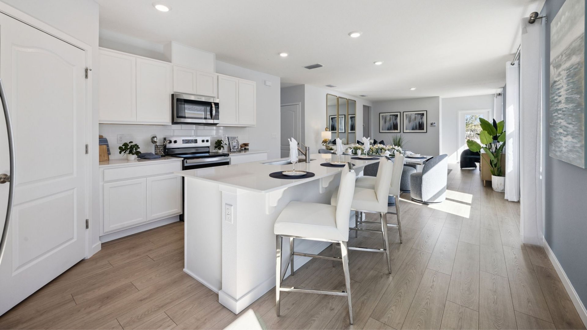 kitchen with quartz counters and laminate flooring