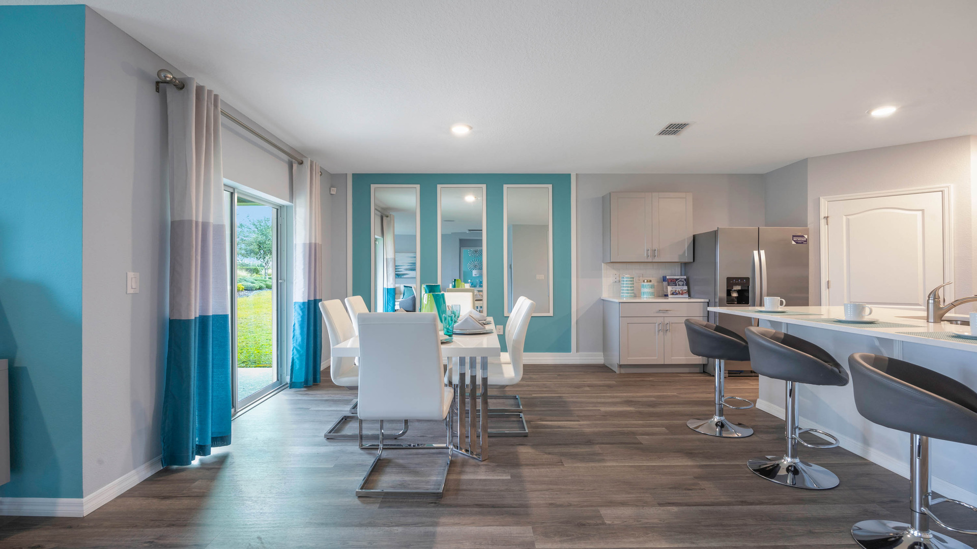 dining room with table seating with access to backyard.