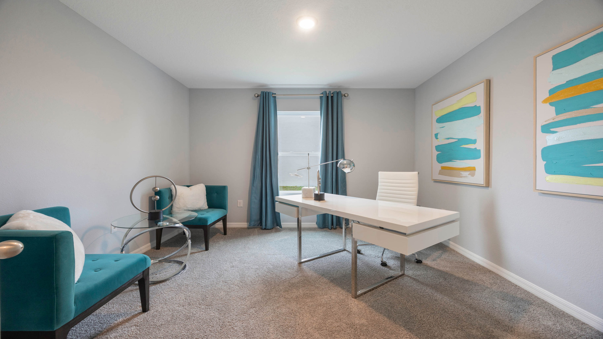 Functional home office with desk, chairs and space to work or play.