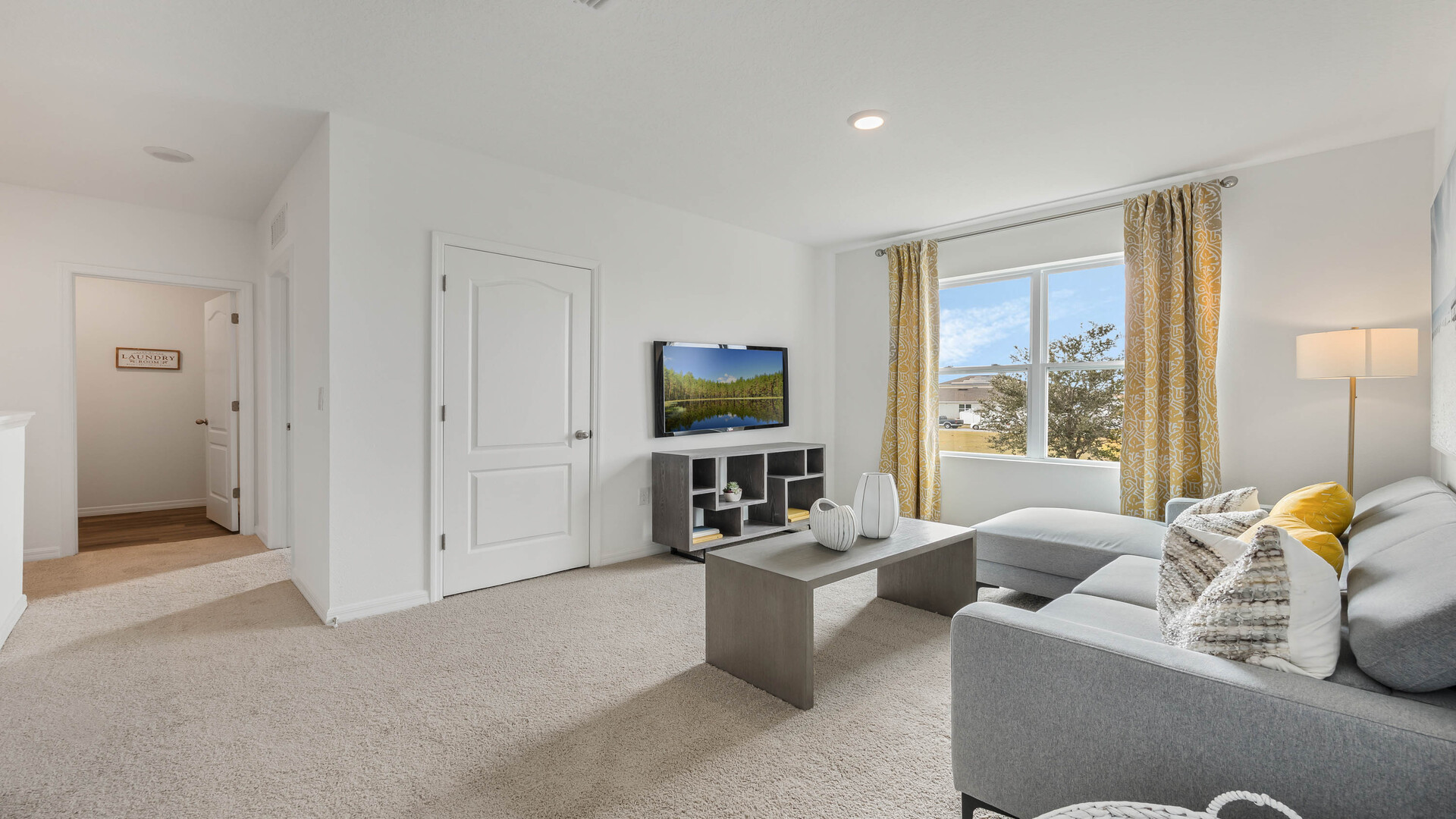 Multi-purpose open area perfect for entertaining, work or play.