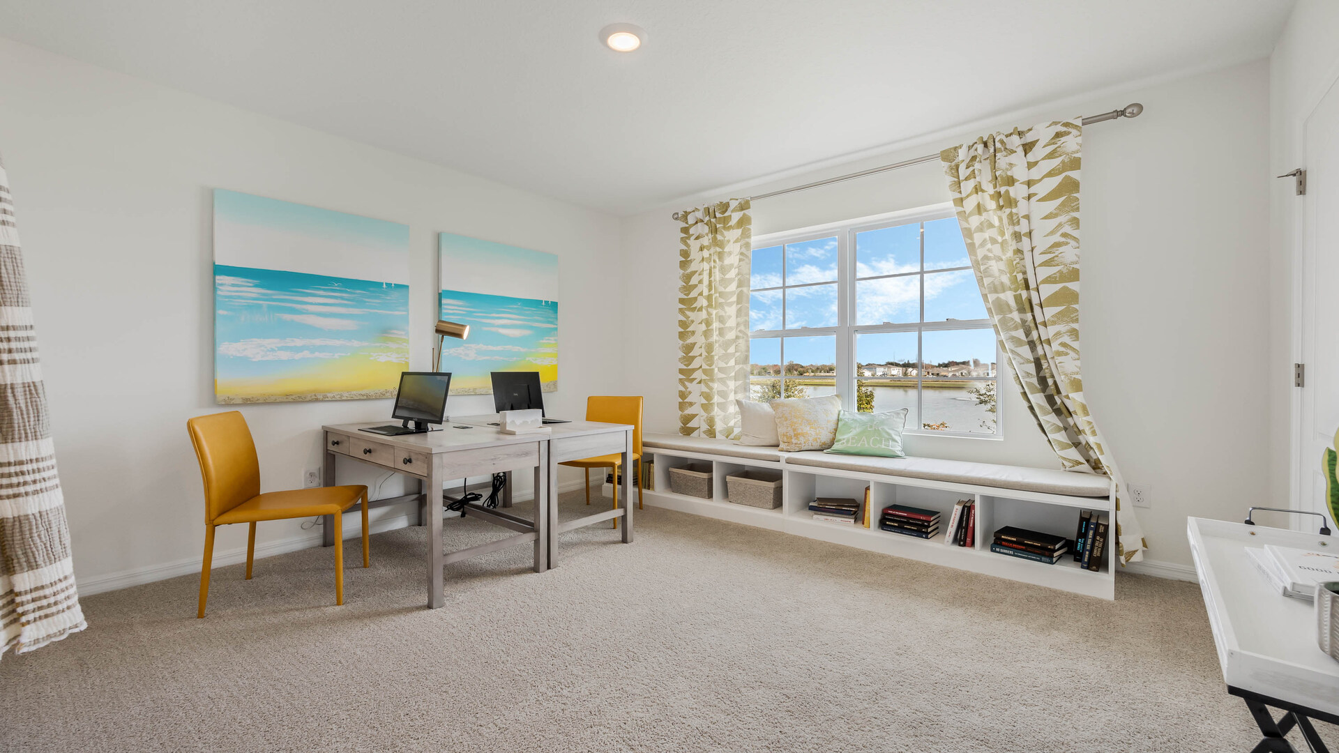 Guest bedroom with bed, nighstands and natural lighting.