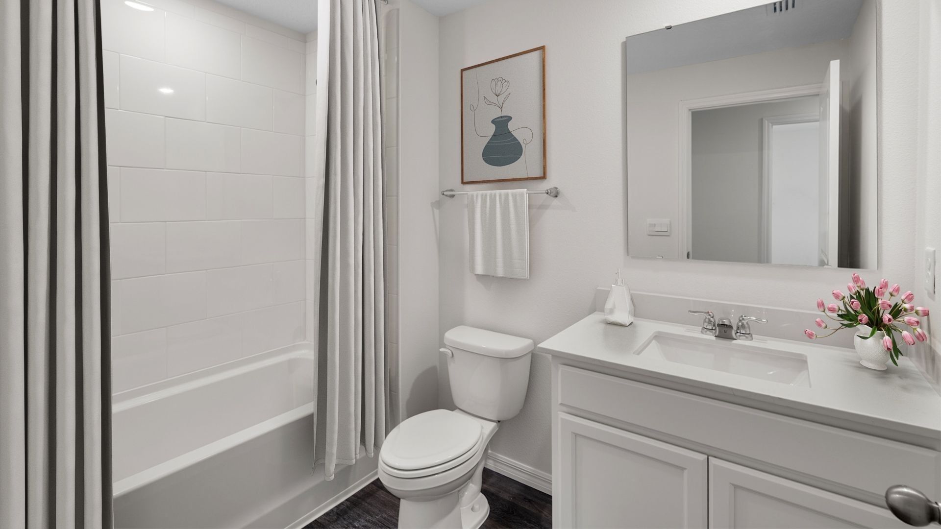 guest bathroom with quartz counters and lvp