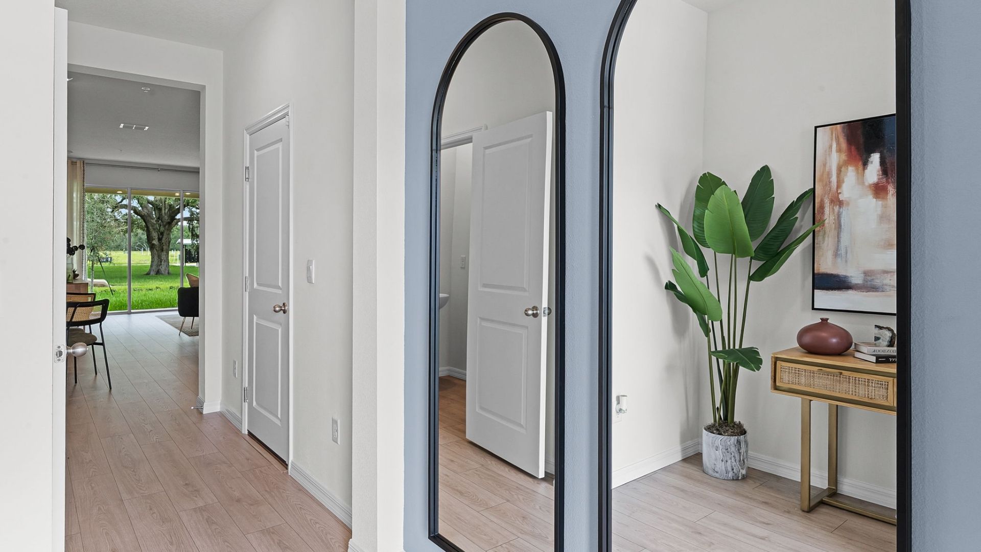 entry way to home with laminate flooring