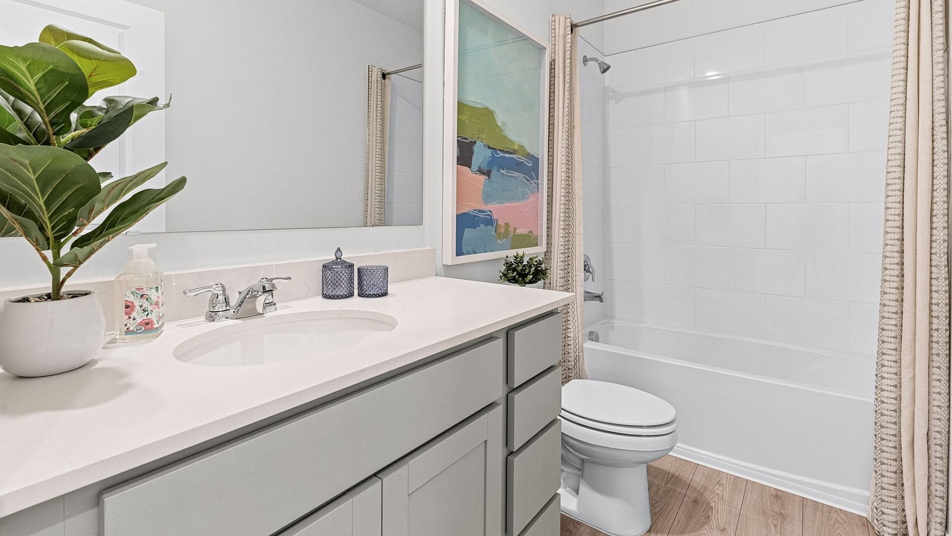 bathroom quartz counters and laminate flooring