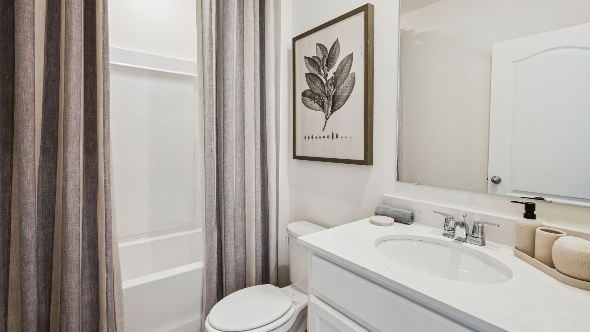 guest bathroom with shower and counters