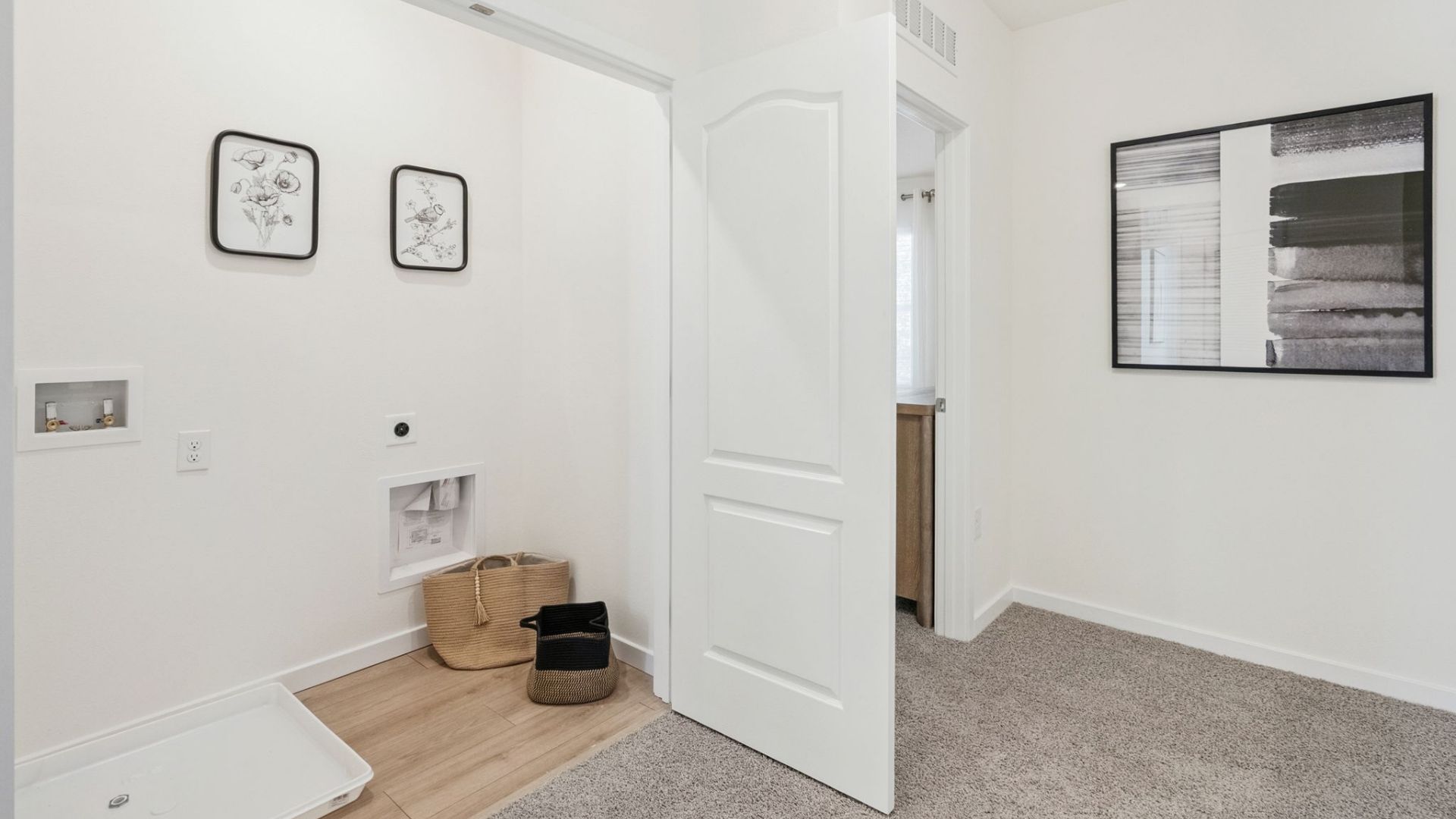 laundry room with revwood select flooring
