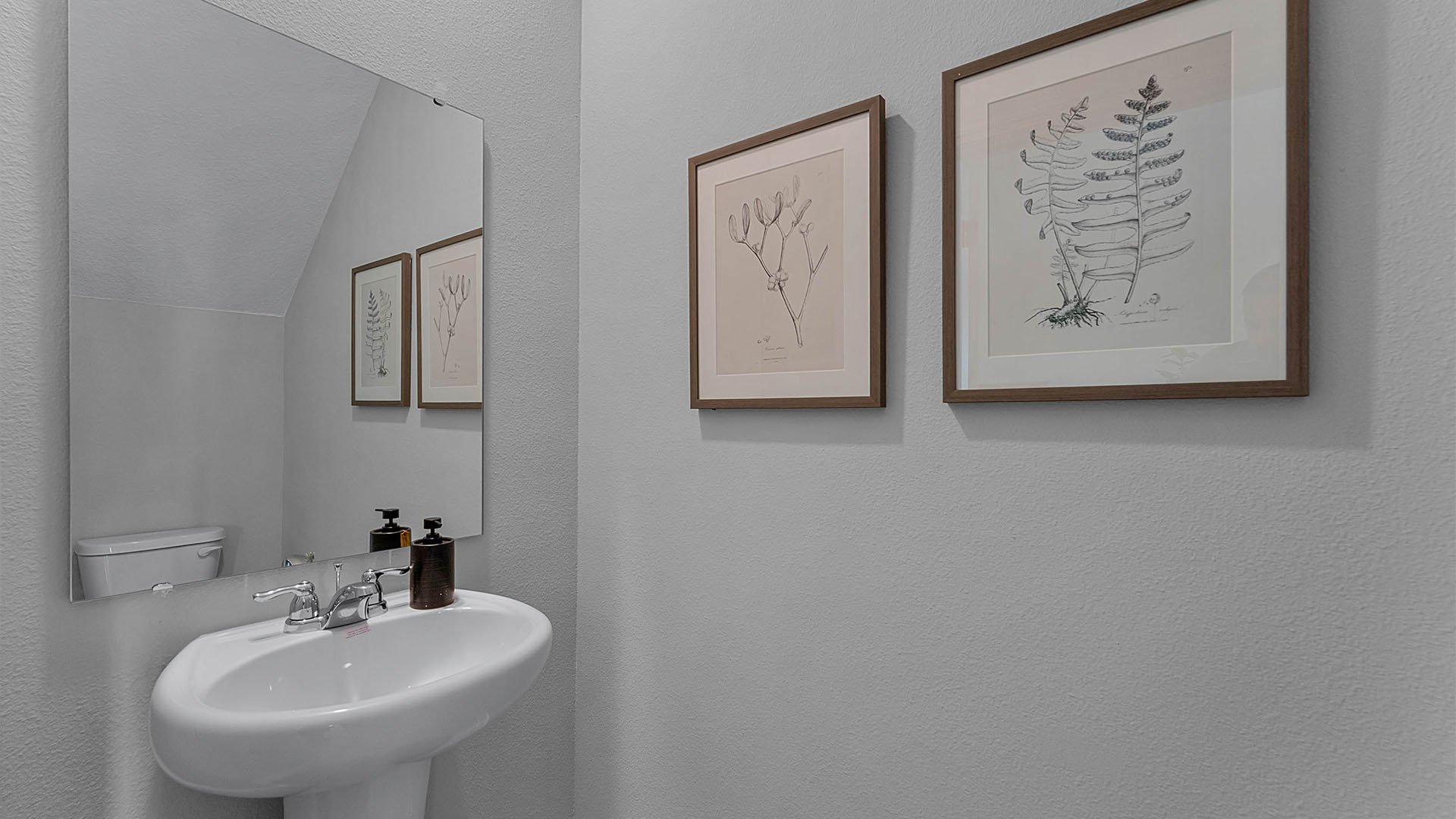 Bathroom with bowl sink and walk in shower.