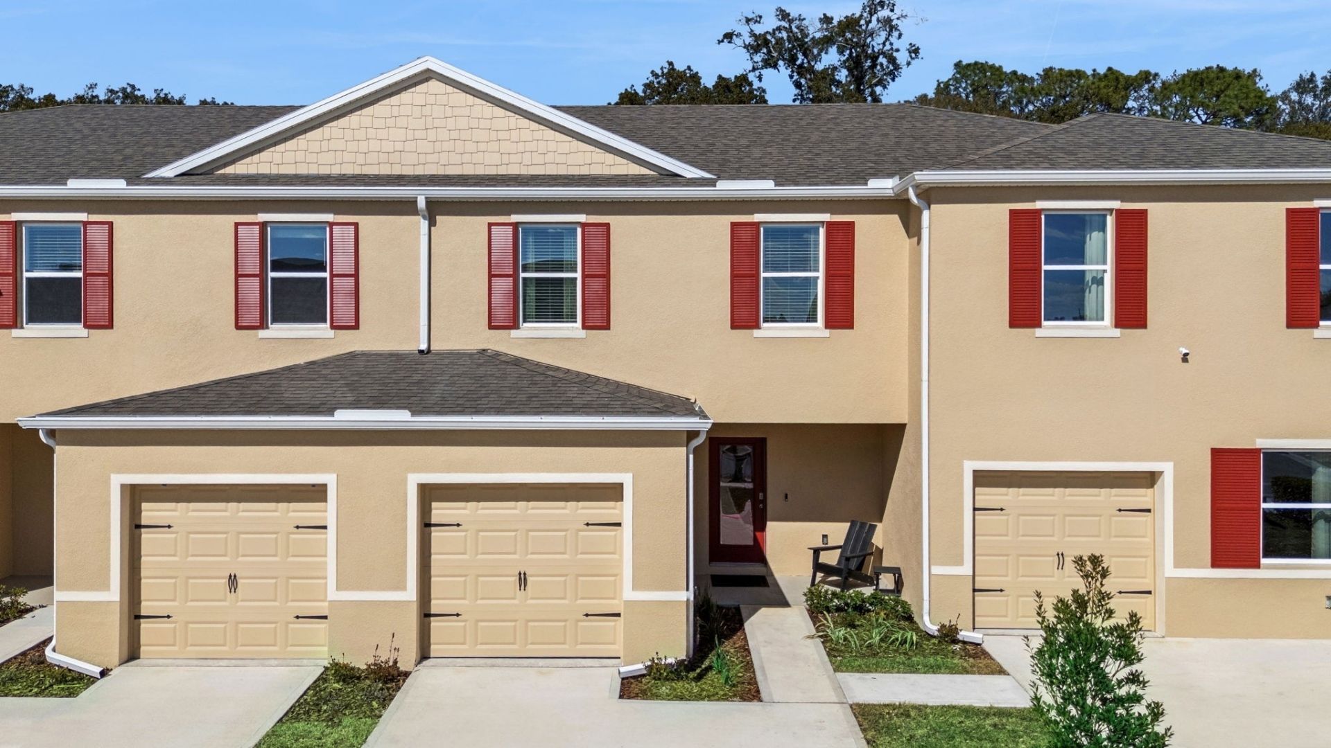 Attached townhome with concrete block construction and a one-car garage.
