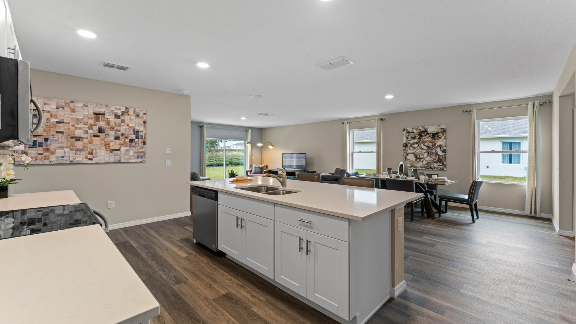 kitchen quartz counters and luxury vinyl plank flooring