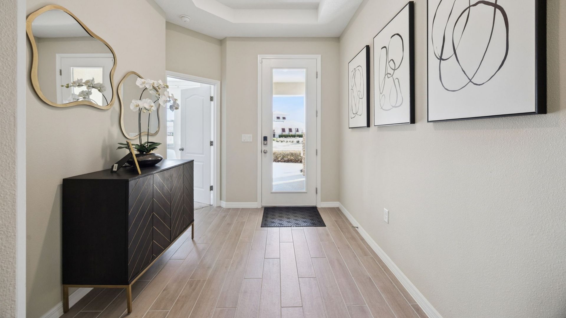 entry way of home with guest bedroom on side