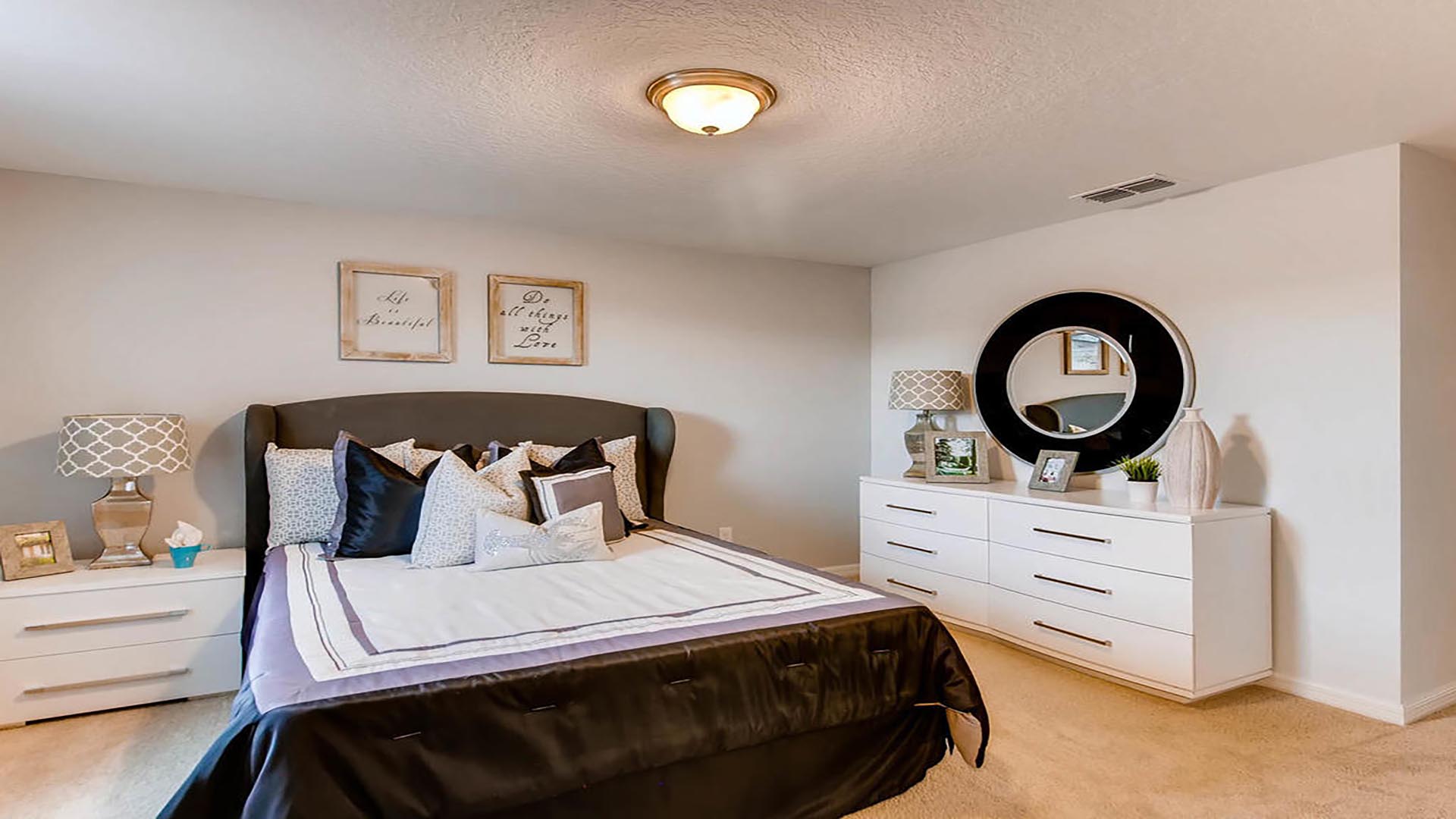 primary bedroom with king sized bed