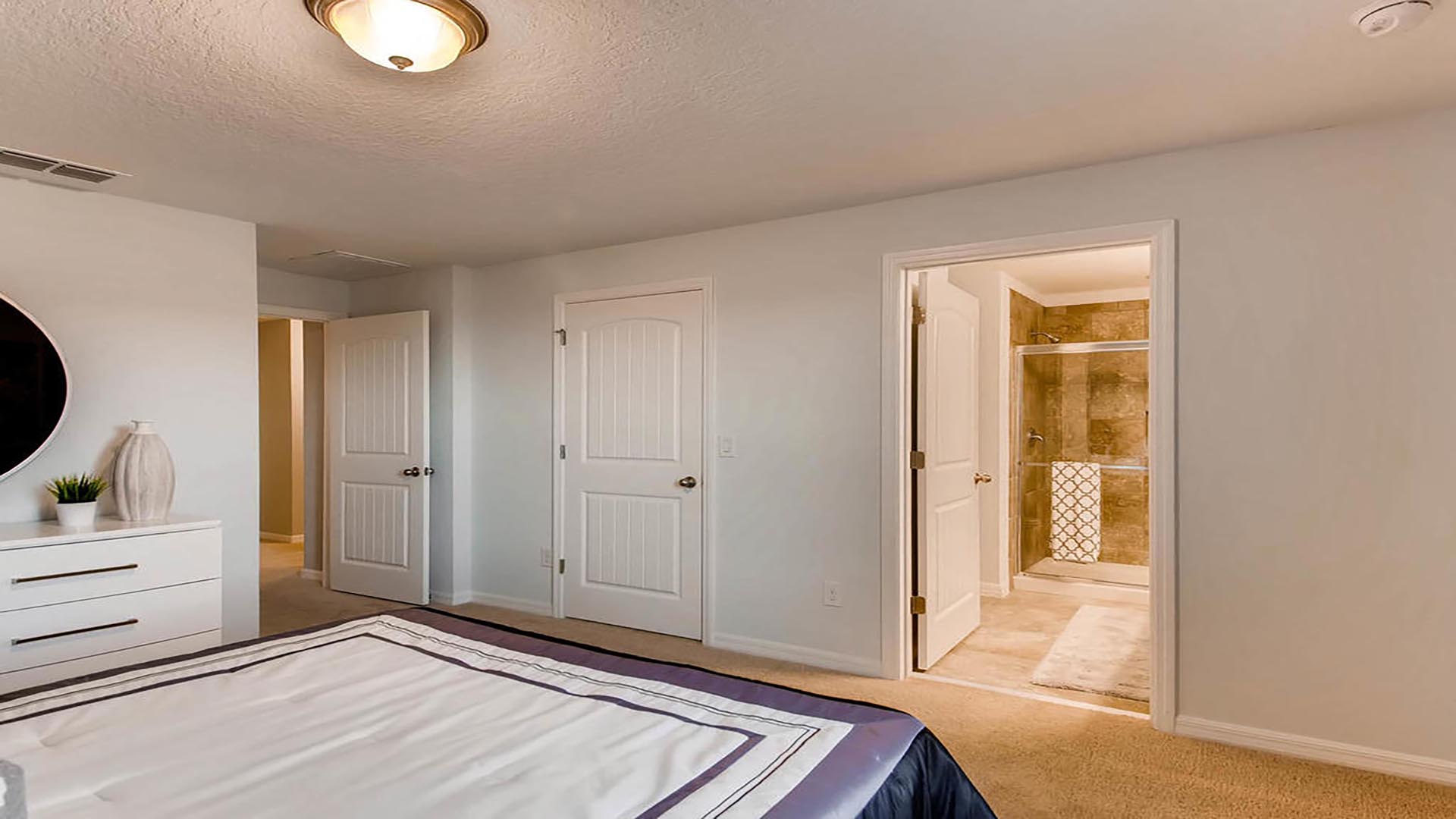 primary bedroom with king sized bed
