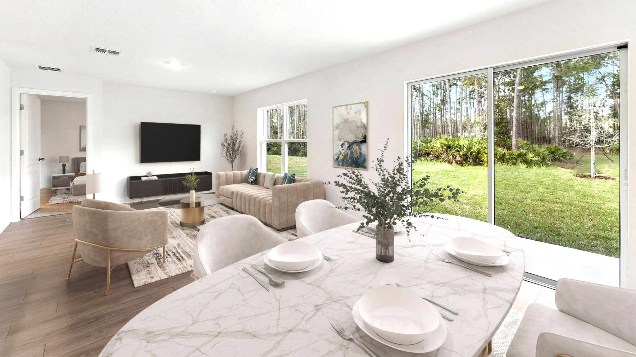Living area with couch seating, entertainment system and natural lighting overseeing dining room table