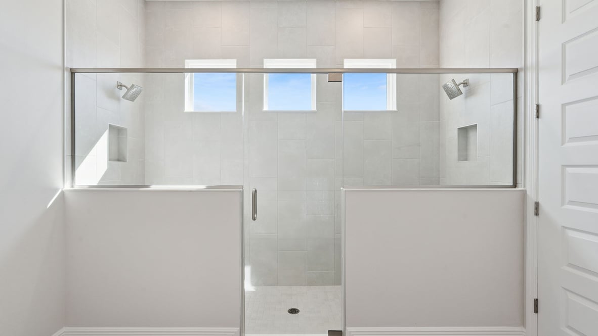 Bathroom with two showers