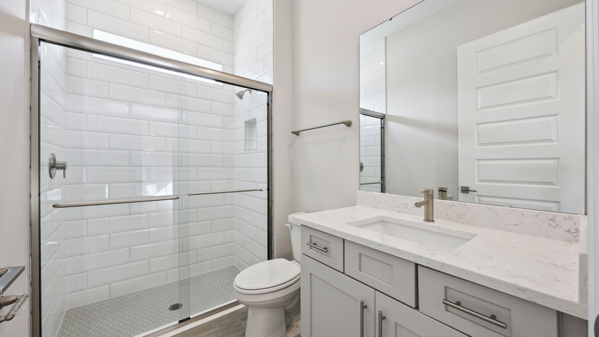 bathroom with quartz counters