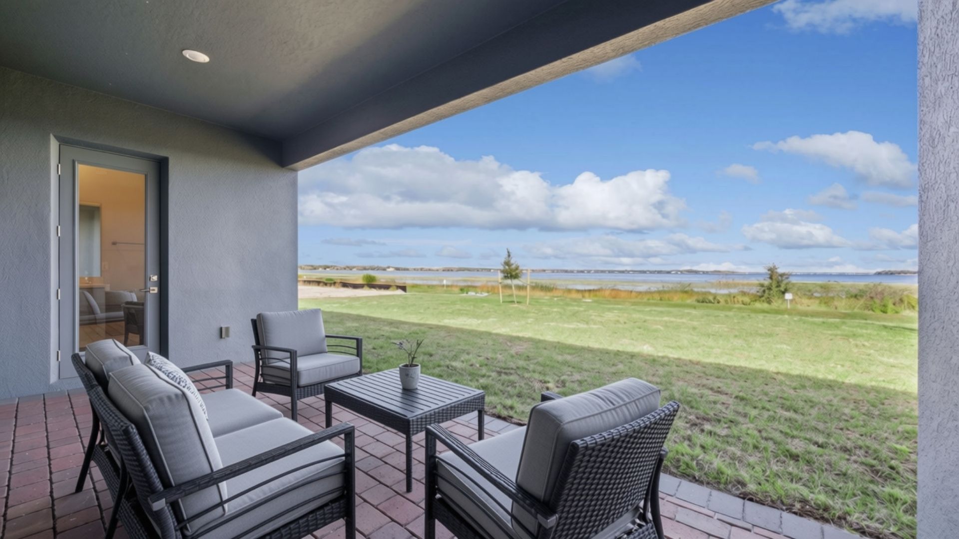 lakelot Single story new home with large windows and 2 car garage.
