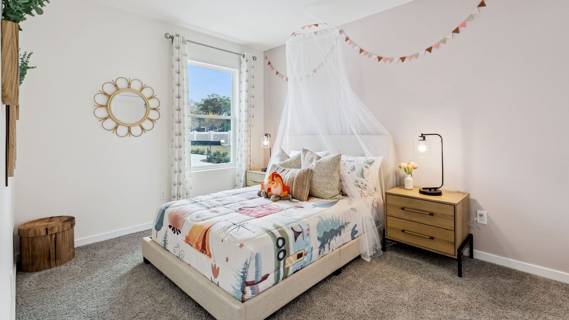 Guest bedroom with bed, nighstands and natural lighting.