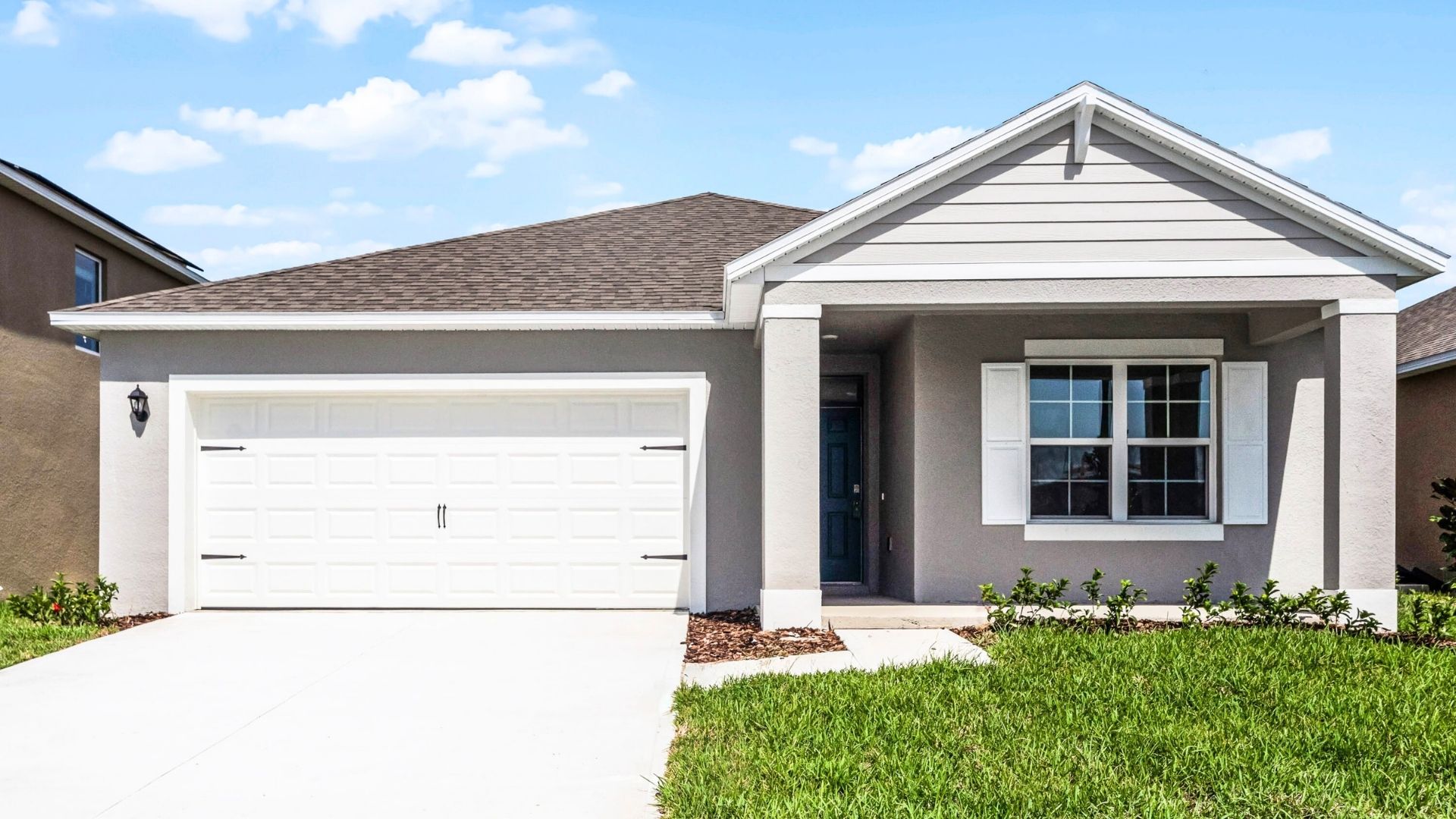 single story home with two car garage