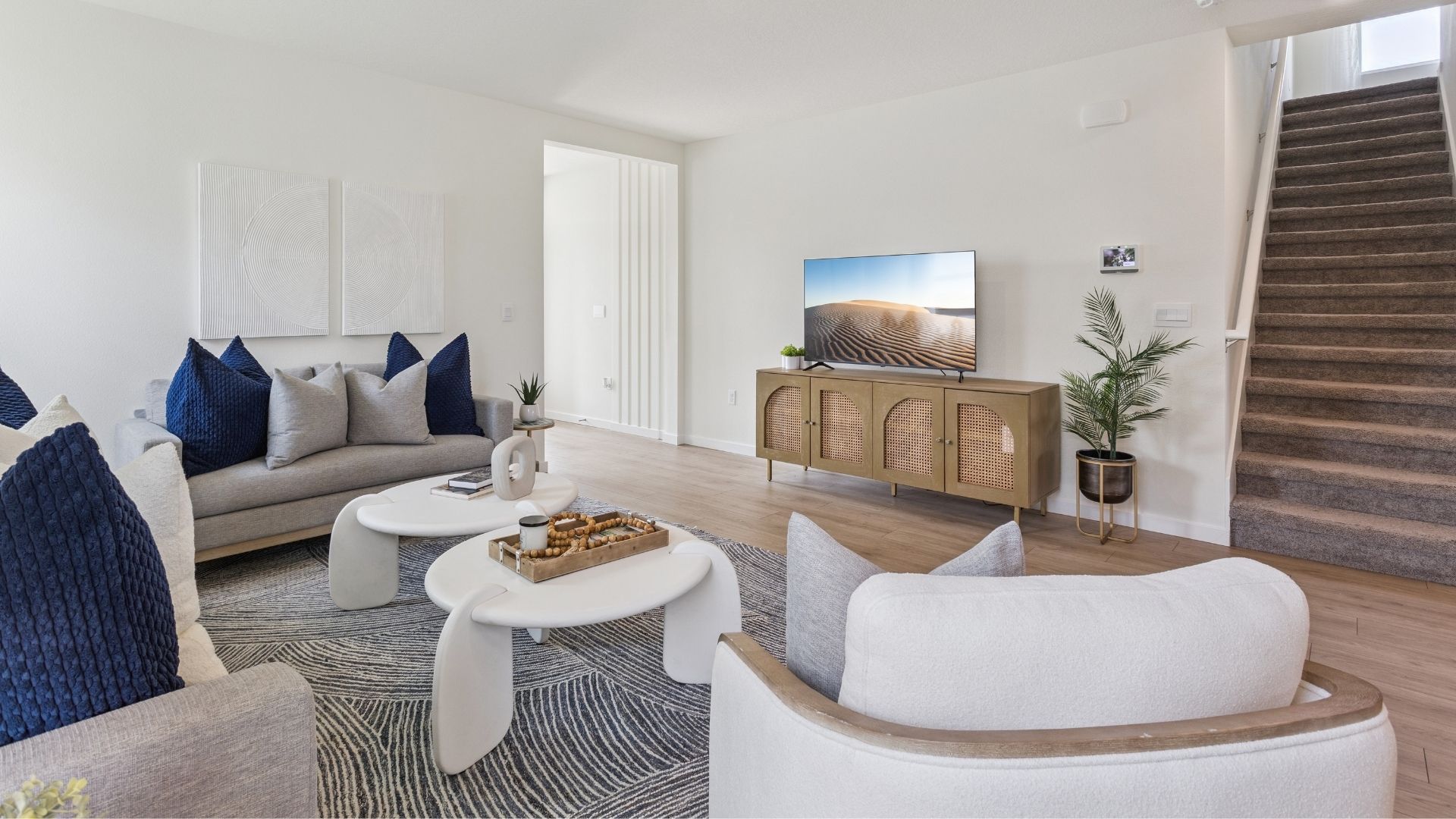 living area with laminate flooring