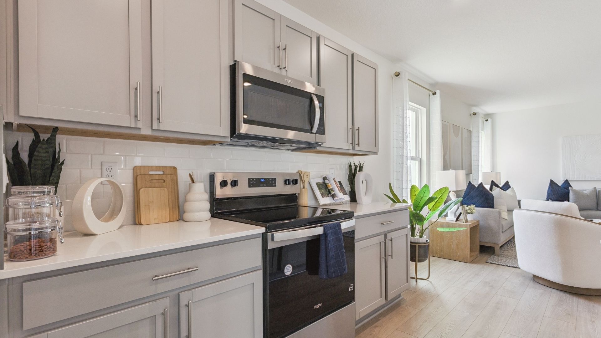 kitchen with quartz counters and laminate flooring