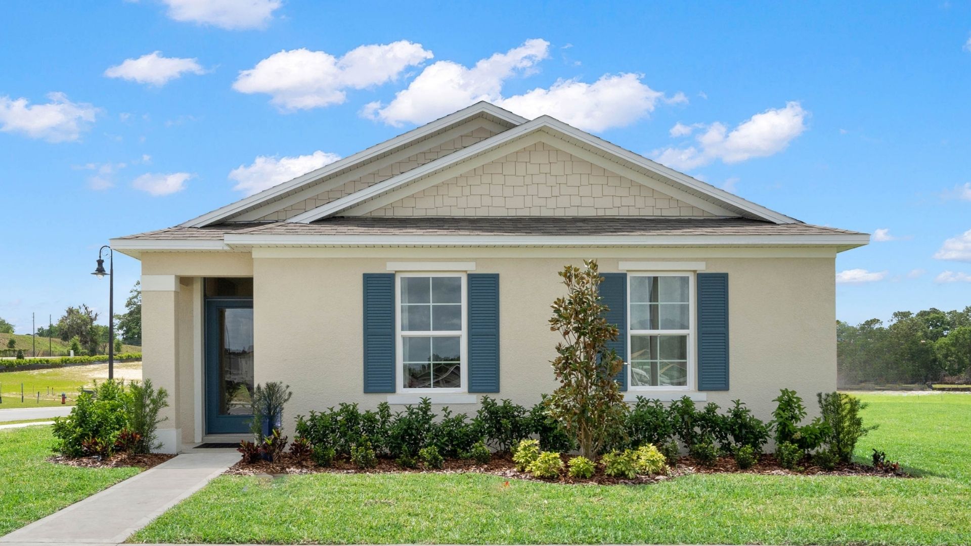 Single story new home with large windows.
