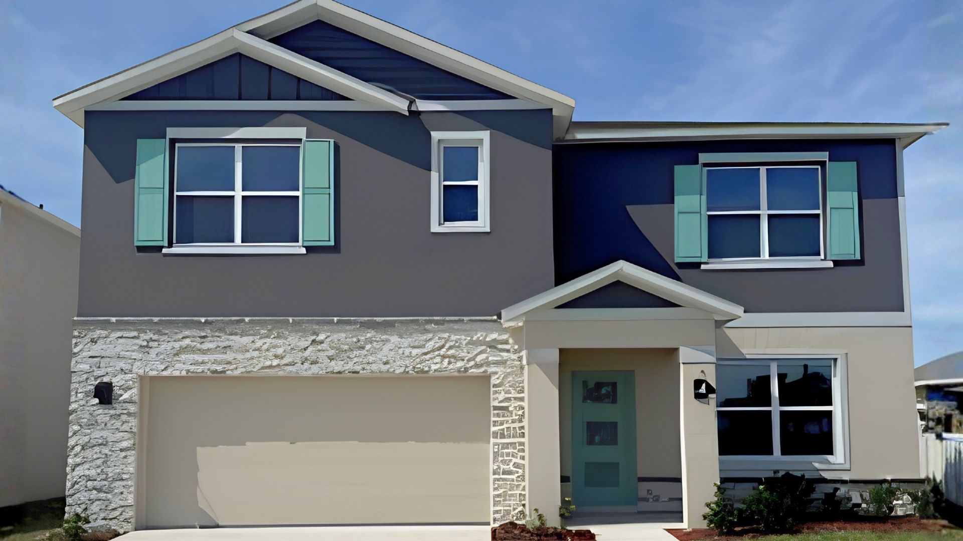 two story home with two car garage