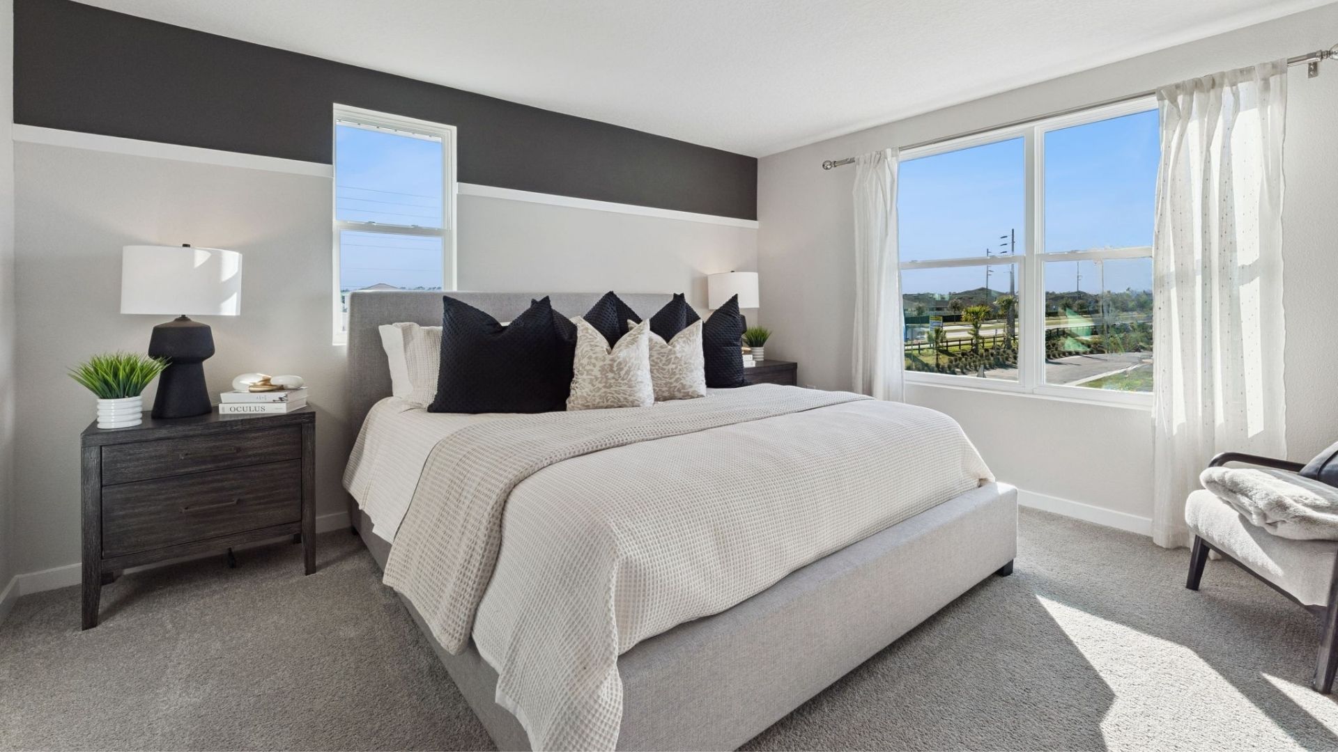 king sized bed in primary bedroom