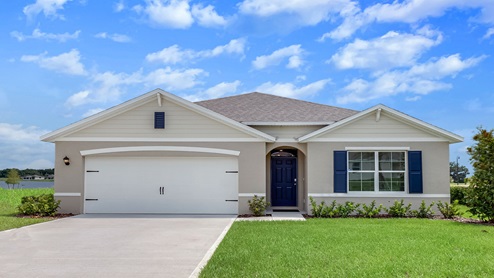 Single story new home with large windows and 2 car garage.