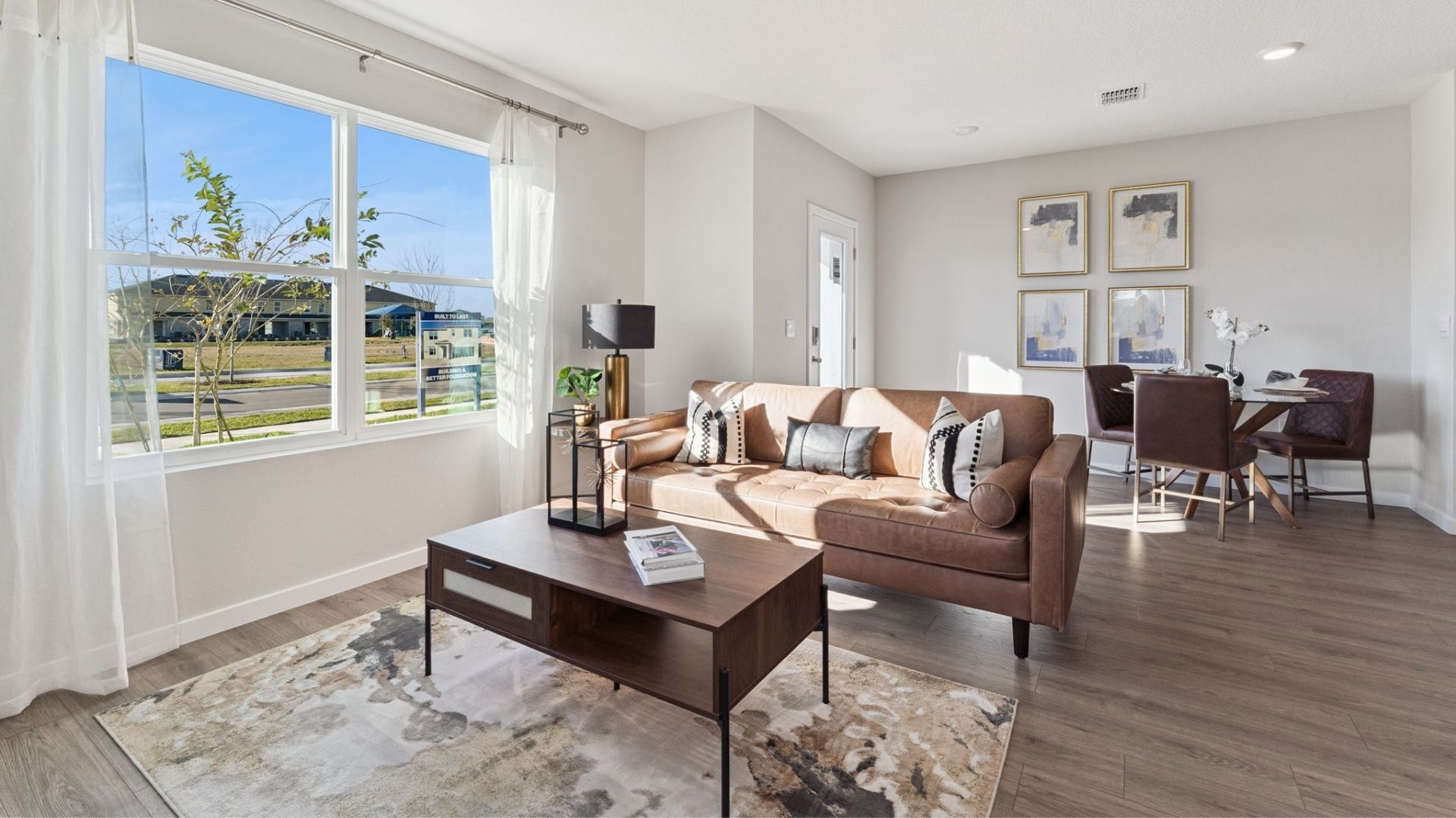 living area laminate flooring and quartz counters
