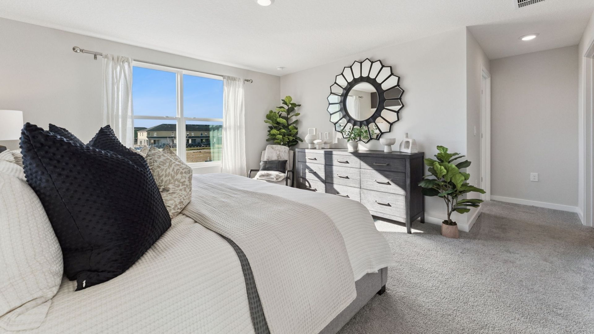 primary bedroom with king sized bed