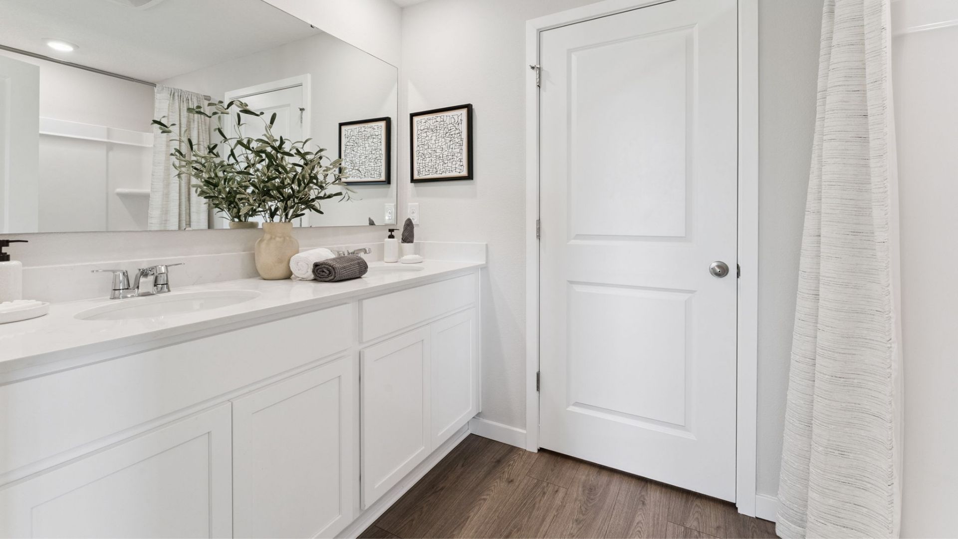 bathroom laminate flooring and quartz counters