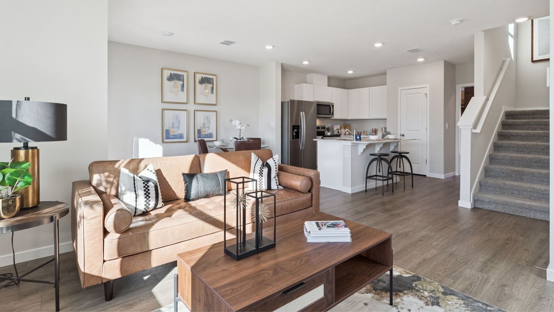 living area laminate flooring and quartz counters