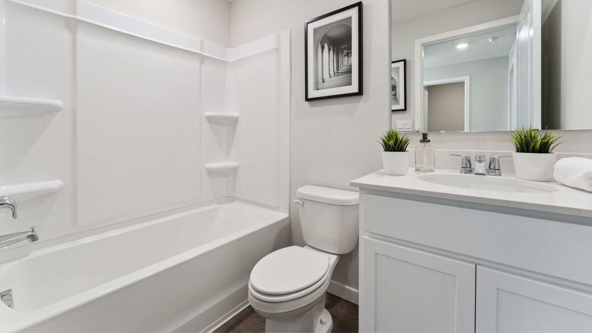 bathroom laminate flooring and quartz counters