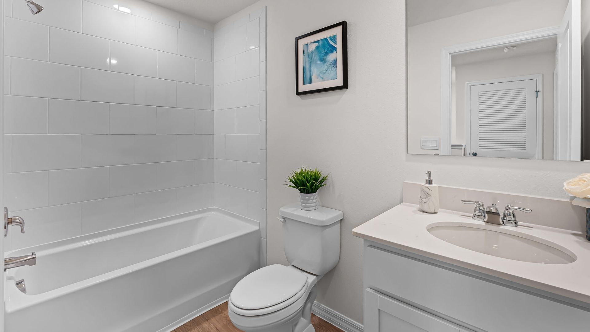guest bathroom, revwood flooring, quartz counters