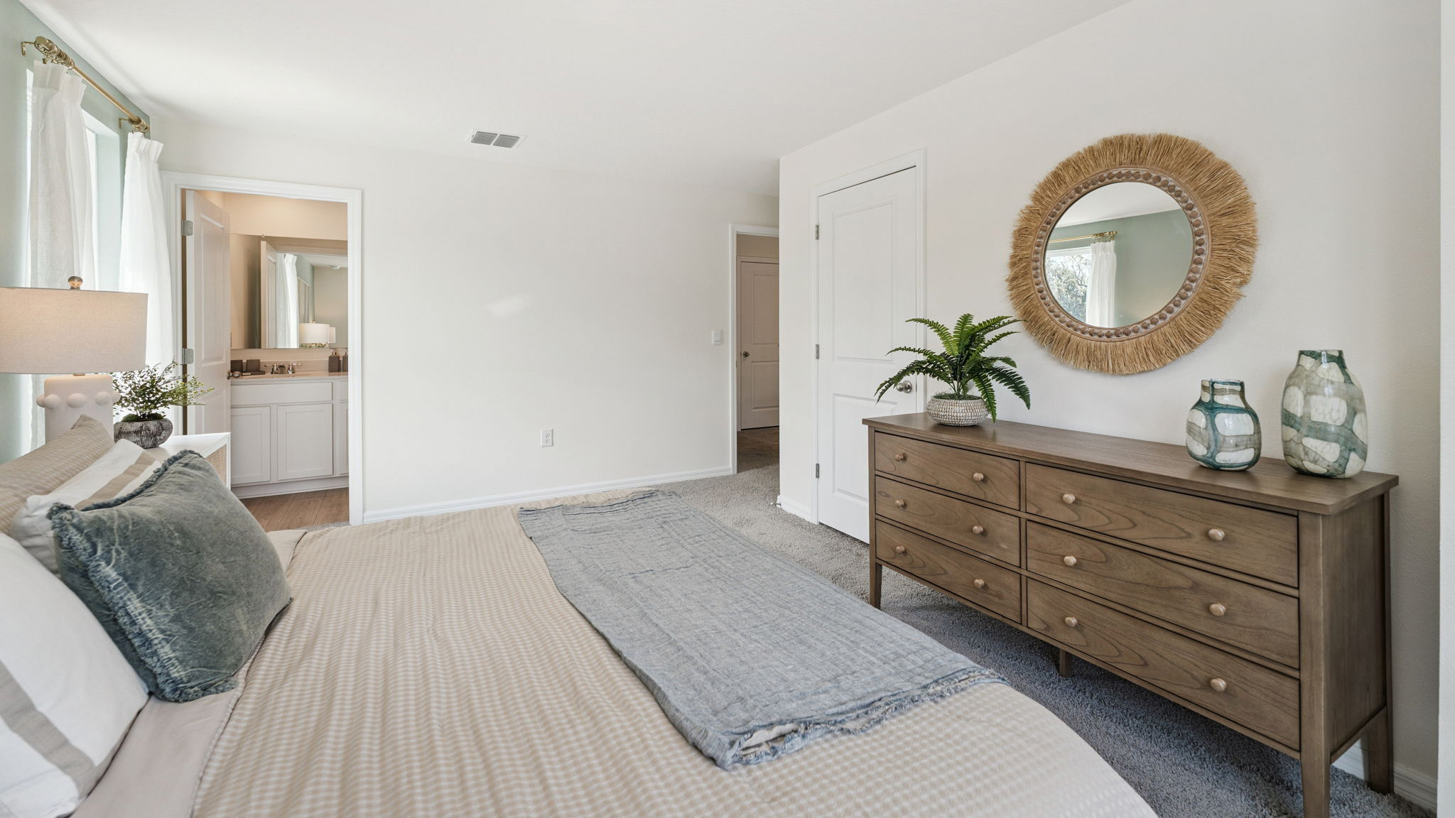 guest bedroom with queen sized bed