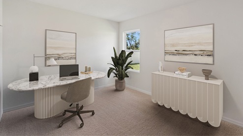 study with desk and carpet flooring